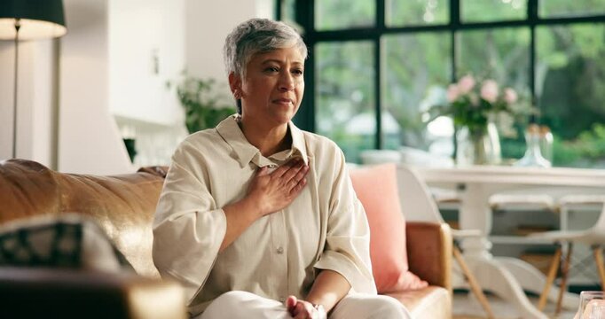 Mature woman, cough and chest pain on couch with massage, stress and tired breathing in living room. Person, sore throat and virus with lung disease, flu and sick with fatigue on sofa at house