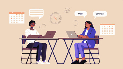 Two Colleagues Working Together on Laptops