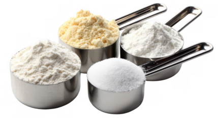 Metal measuring cups filled with white flour, granulated sugar, and golden corn flour, arranged against a transparent background, provide essential resources for culinary creations