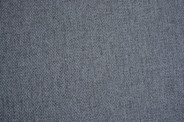 Things, objects, fabric backgrounds. Beautiful dense gray quality fabric with dark inclusions.