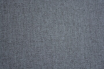 Things, objects, fabric backgrounds. Beautiful dense gray quality fabric with dark inclusions.
