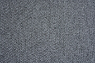Things, objects, fabric backgrounds. Beautiful dense gray quality fabric with dark inclusions.
