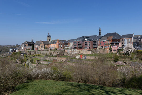 Panoramic view of the colorful Hanging Gardens of Thuin, in Hainaut Province in Belgium, captured in the springtime, on a sunny blue sky day. Copy space above.