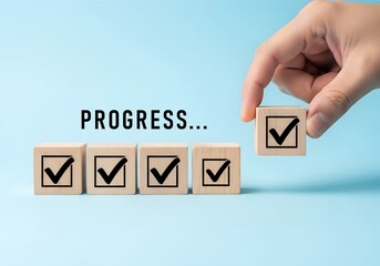Achieving Progress Milestones Checkmarks on Wooden Blocks Business Concept