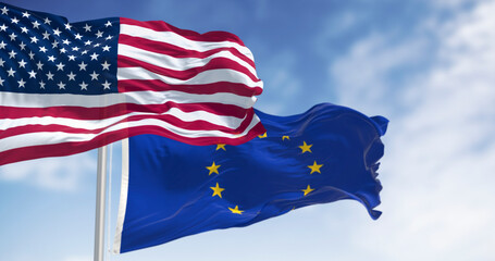 Flags of the United States of America and the European Union waving in the wind