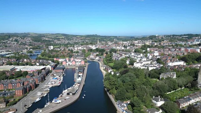 Exeter, Devon, England: DRONE VIEWS: Heading northwards over the River Exe and onwards to the Quays. Exeter is a popular UK travel destination.
