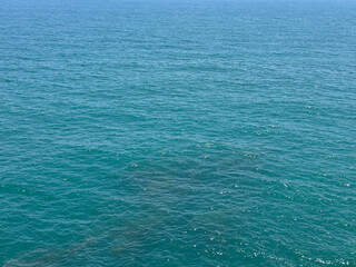 Blue sea water calm surface background.