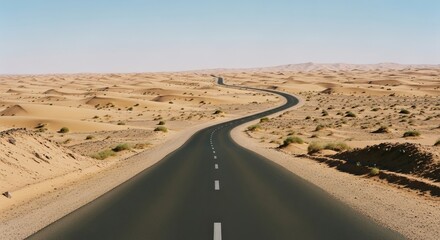 Desert Highway Journey - A winding asphalt road cuts through a vast, sandy desert landscape under a clear blue sky