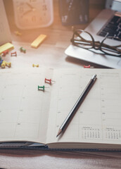 Pins on Calendar book for Planner and organizer to plan and reminder daily appointment, meeting agenda, schedule, timetable, and management of job, Work online from home. Calendar reminder event Conce