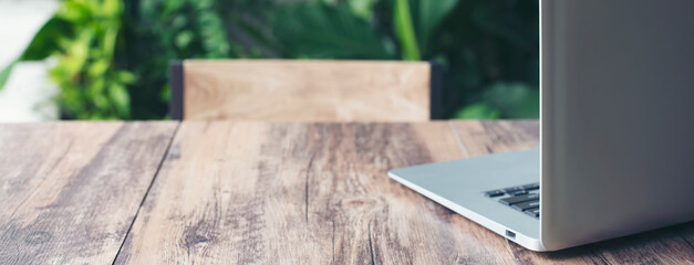 Desk for student concept. Desktop Laptop Computer for study for exam place on School table for student work online at home-banner image.