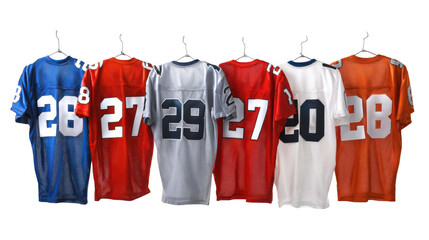 Studio shot featuring a row of colorful football jerseys hanging on hangers against a transparent background, showcasing the back of the jerseys with various numbers