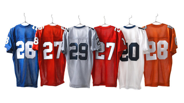 Studio shot featuring a row of colorful football jerseys hanging on hangers against a transparent background, showcasing the back of the jerseys with various numbers