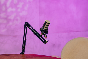 Engaging podcast setup featuring a microphone and headphones in a vibrant atmosphere