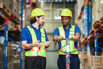 Transport workers in safety gear carry out delivery logistics, showing real warehouse tasks. Logistic and supply chain working.