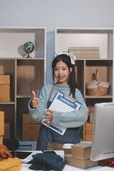 Young asian women happy after new order from customer. Surprise and shock face of asian woman success on making big sale of his online store. Online Selling. Online Shopping