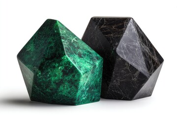 Two sculpted stone objects in contrasting colors.