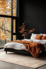 Modern bedroom with autumnal hues. Large window overlooking fall foliage