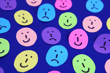 Background with faces expressing different moods