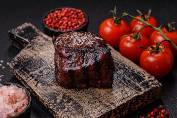 Grilled beef steak meat with salt and pepper. Beef steak grilled on a barbecue