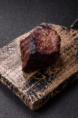 Grilled beef steak meat with salt and pepper. Beef steak grilled on a barbecue