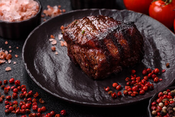 Grilled beef steak meat with salt and pepper. Beef steak grilled on a barbecue