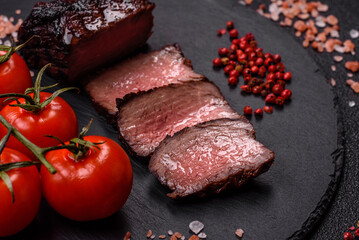 Grilled beef steak meat with salt and pepper. Beef steak grilled on a barbecue