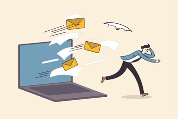 Email overload too many junk mails that reduce efficiency and productivity in work and time management concept, businessman office guy run away from overload flying mail letter from computer laptop.
