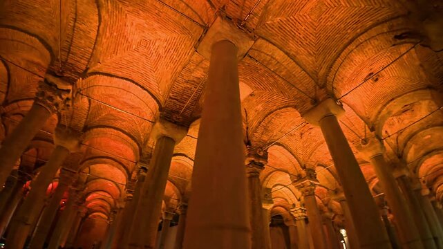 Basilica Cistern , a wide-angle view capturing the columns, arches, and detailed brickwork of an underground historic structure, emphasizing its architectural grandeur