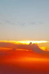 silhouette of clouds and sun in an afternoon
