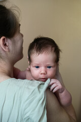 Tender Moment Between Mother and Newborn Baby