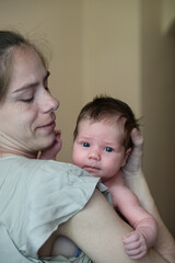 Tender Moment Between Mother and Newborn Baby