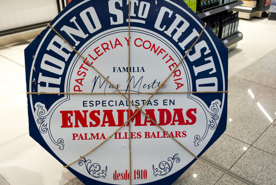 Mallorca, Spain - April 05, 2025: Horno Santo Cristo bakery sign featuring ensaimadas specialty in Palma, Mallorca with vibrant colors and intricate design