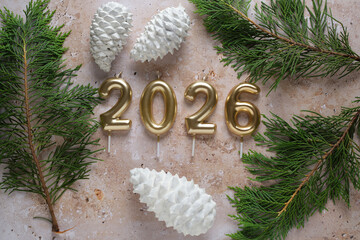 Festive New Year 2026 Celebration With Candles and Pine Cones
