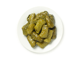 stuffed vine leaves on dish isolated