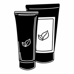 Professional cutout of two black cream tubes on white background