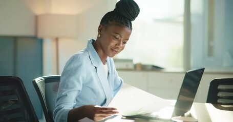 Office, laptop and woman with paperwork, reading or accountant with financial report, web or typing. Happy, employee and black person with documents for investment, corporate and smile for project - Powered by Adobe