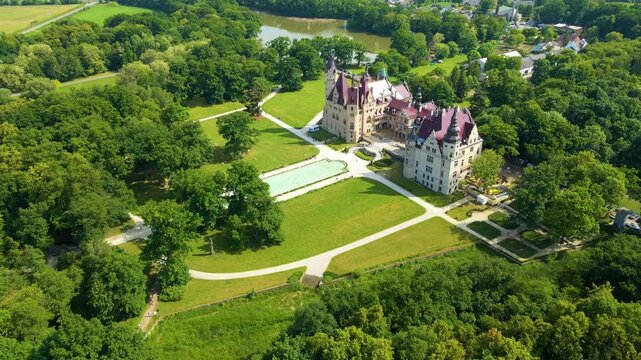 Moszna Castle fly over landscape view from above architecture near the village Moszna Poland