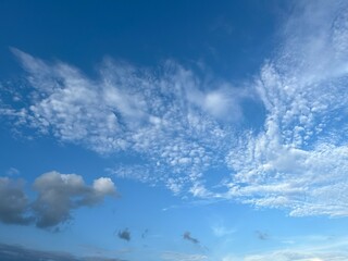 Beautiful Sky with Clouds and Blue Background in Daylight Atmosphere