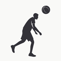 Young man silhouette playing basketball catching ball