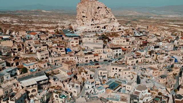 The Famous Uchhisar Cave Castle In Cappadocia, At Sunset, Turkey, Aerial View