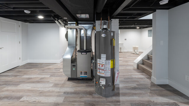 Detroit, Michigan -USA- May 9, 2025: home has been updated with a new furnace and hot water tank installed in the basement