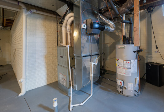 Detroit, Michigan -USA- May 9, 2025: home has been updated with a new furnace and hot water tank installed in the basement