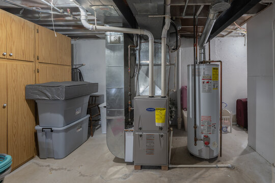Detroit, Michigan -USA- May 9, 2025: home has been updated with a new furnace and hot water tank installed in the basement