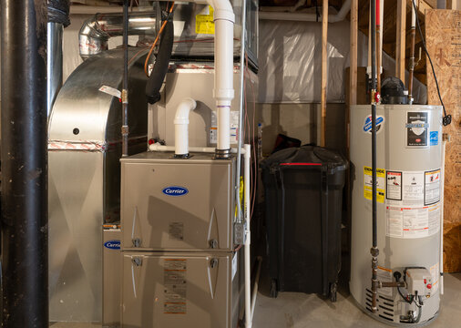 Detroit, Michigan -USA- May 9, 2025: home has been updated with a new furnace and hot water tank installed in the basement