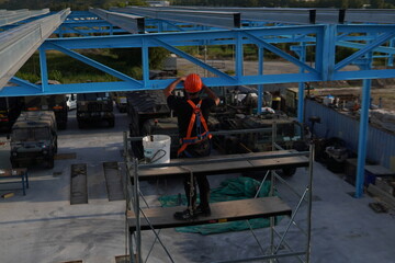 Steel structure for a military base. Construction site, steel frame of future military...