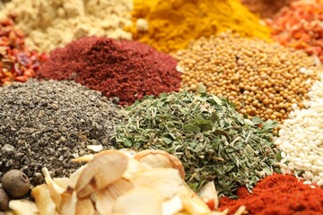 Different aromatic spices as background, closeup view