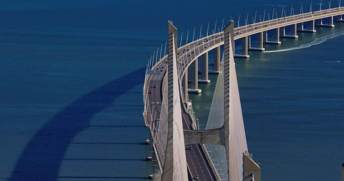 Aerial view of Vasco da Gama bridge crossing the Tagus river in Lisbon, Portugal. Modern design