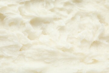 Texture of organic shea butter as background, top view