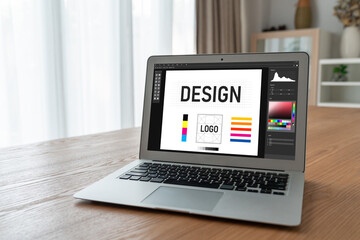 Graphic designer software for modern design of web page and commercial ads showing on the computer...