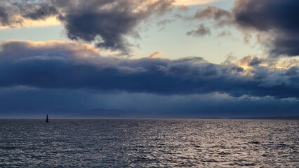 Lonely sailboat in the storm